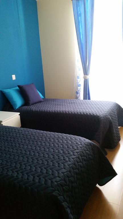 Apartamento Anjos Hotel Lisbona Camera foto